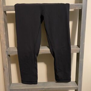 Lululemon Capri leggings, size 6 worn twice. Kid takes tags out of clothes.